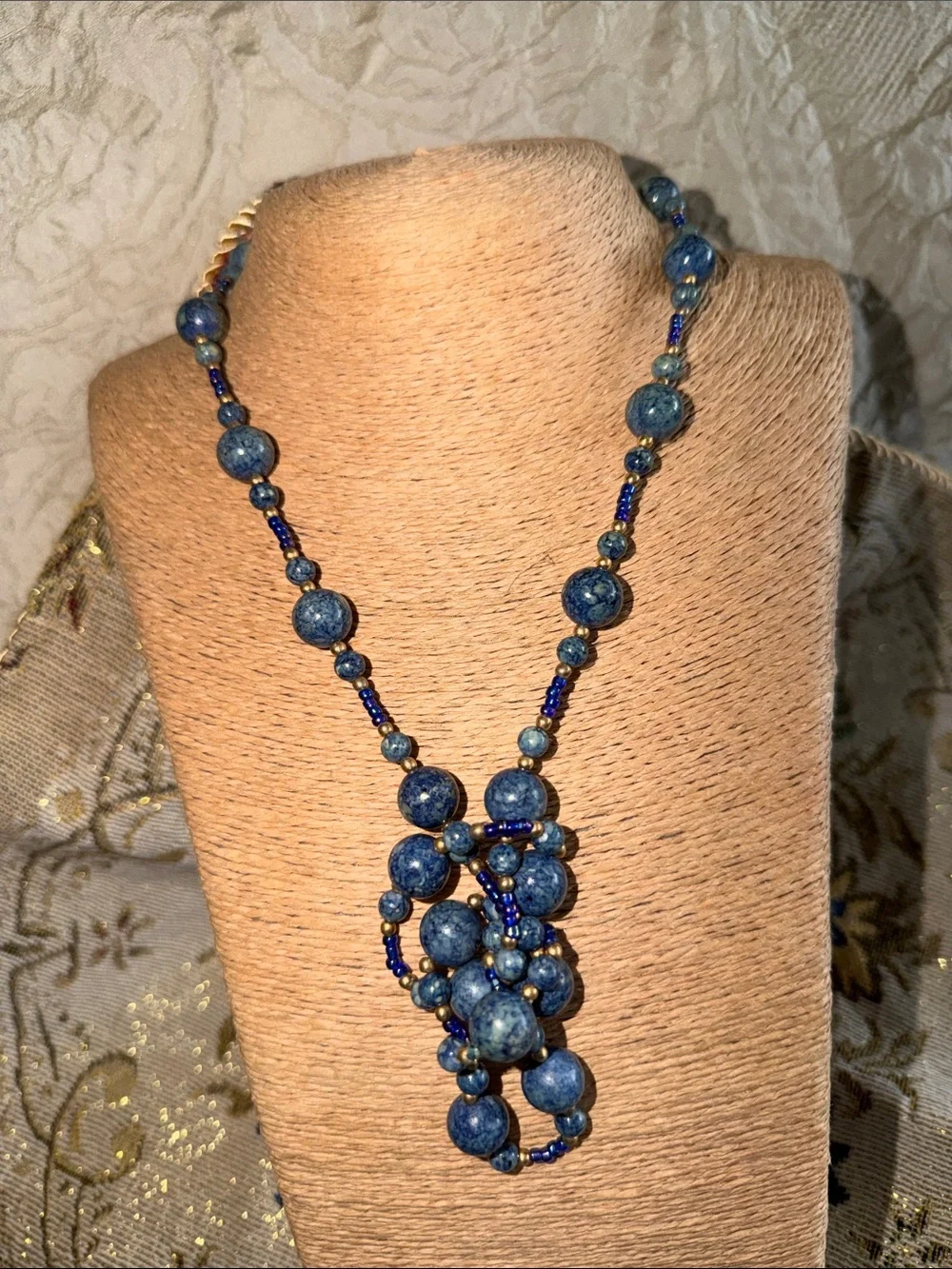 Blue lapis with tiny gold balls long or shorter it’s a lovely summer piece